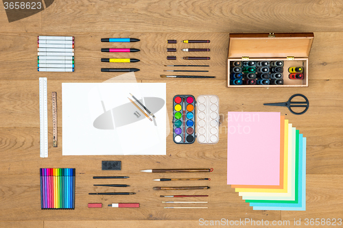 Image of Arts, drawing and design background on wooden surface