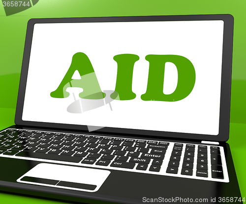 Image of Aid On Laptop Shows Assisting Aiding Help Or Relief