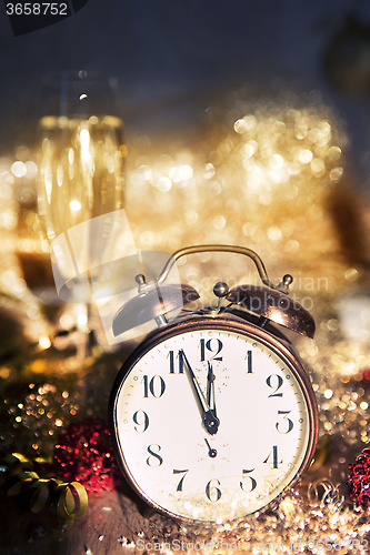 Image of New Year clock and champagne glass