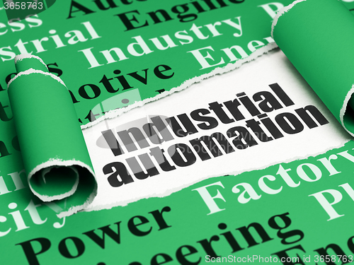 Image of Industry concept: black text Industrial Automation under the piece of  torn paper