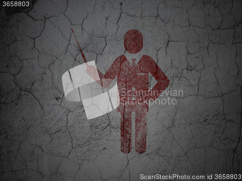 Image of Education concept: Teacher on grunge wall background