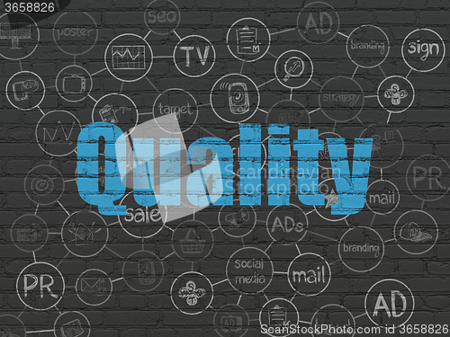 Image of Advertising concept: Quality on wall background