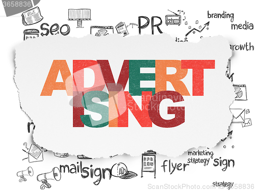 Image of Marketing concept: Advertising on Torn Paper background