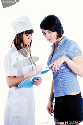 Image of Patient and doctor prescribing medication