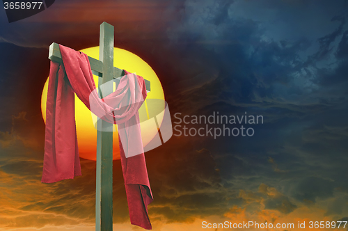 Image of Cross, sun and  sky