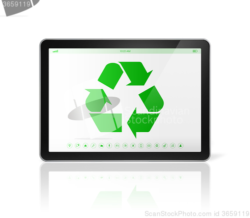 Image of Digital tablet PC with a recycle symbol on screen. environmental