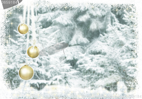 Image of Christmas baubles snow forest