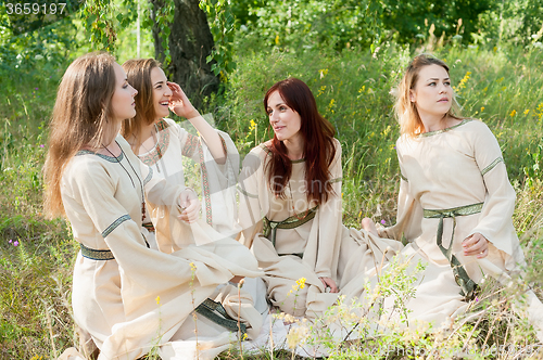 Image of Beautiful women relaxing on nature