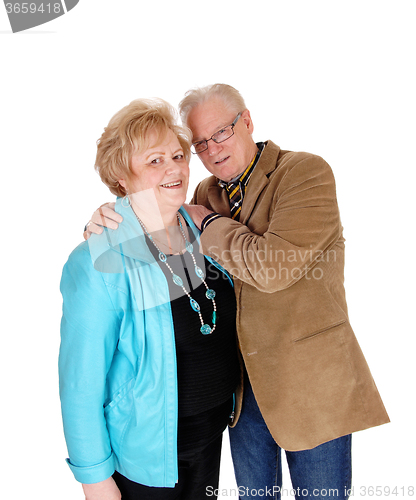 Image of Older man hugging his wife.