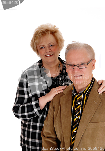 Image of Middle age couple standing.