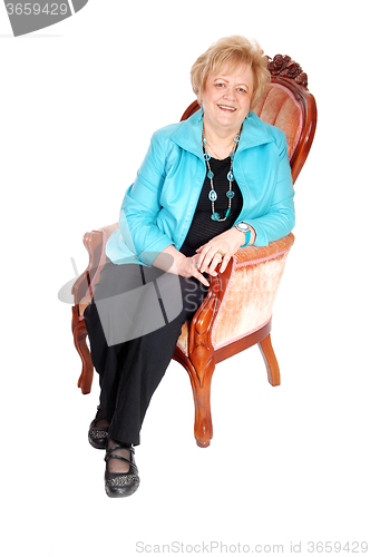 Image of Lovely older woman in armchair.