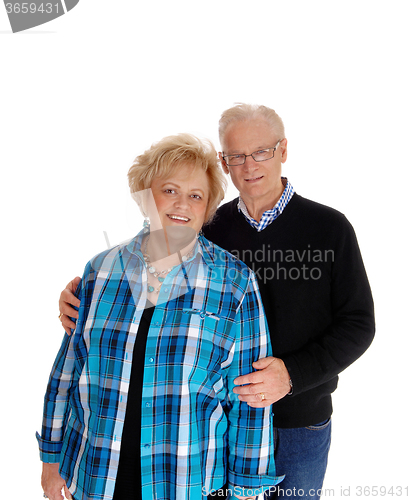 Image of Middle age couple standing.