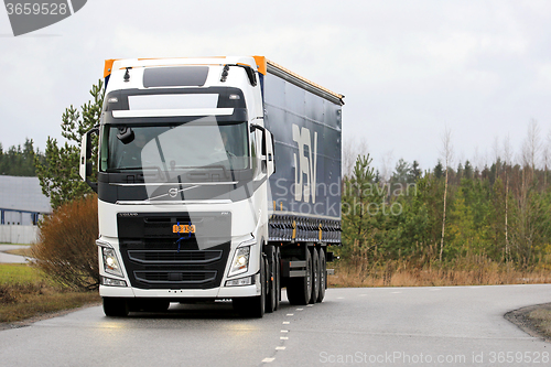 Image of White Volvo FH Semi on the Road