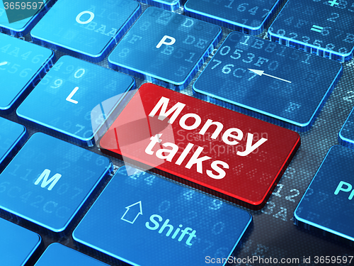 Image of Finance concept: Money Talks on computer keyboard background