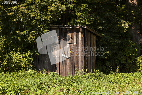 Image of wooden toilet .  park