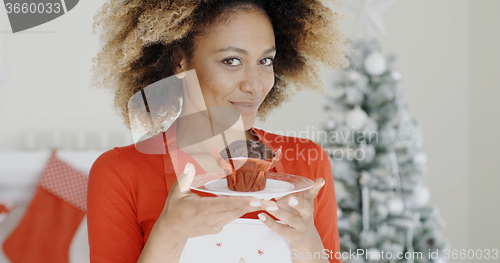 Image of Young cook with a freshly baked Xmas cake