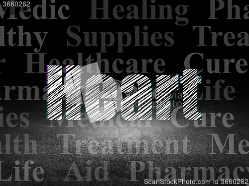 Image of Healthcare concept: Heart in grunge dark room
