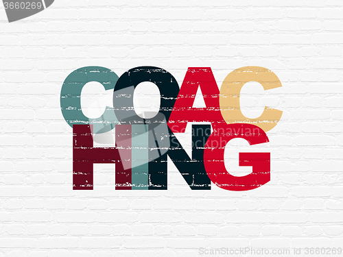 Image of Learning concept: Coaching on wall background