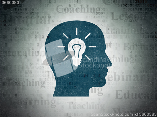 Image of Learning concept: Head With Light Bulb on Digital Paper background