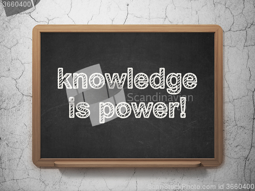 Image of Studying concept: Knowledge Is power! on chalkboard background