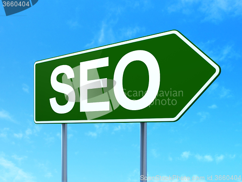 Image of Web design concept: SEO on road sign background