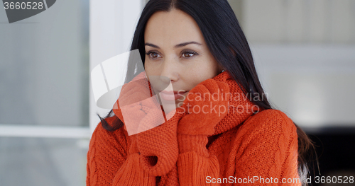 Image of Serious young woman in winter fashion