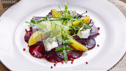 Image of salad of red beets and feta cheese with olive oil