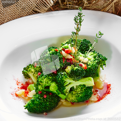 Image of boiled broccoli in white bowl 