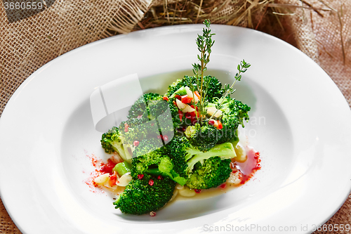 Image of boiled broccoli in white bowl 