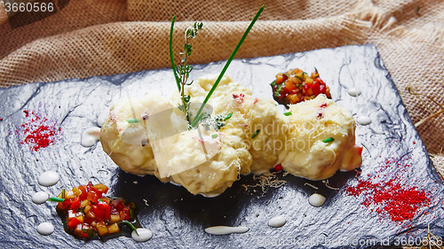 Image of cauliflower bites, vegetarian food.