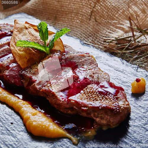 Image of grilled meat, sliced duck