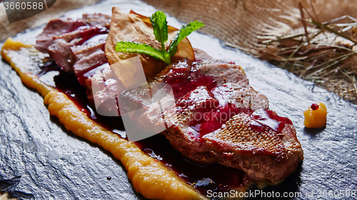 Image of grilled meat, sliced duck