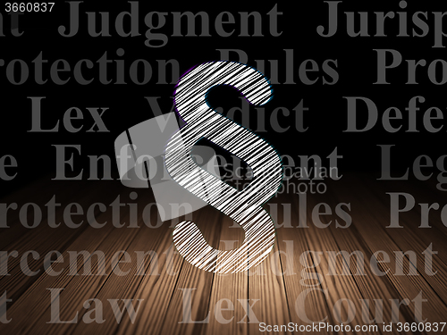 Image of Law concept: Paragraph in grunge dark room