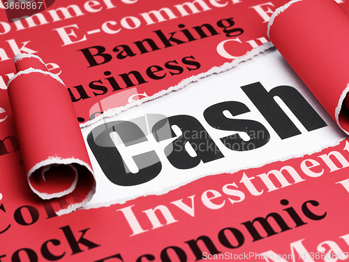 Image of Money concept: black text Cash under the piece of  torn paper