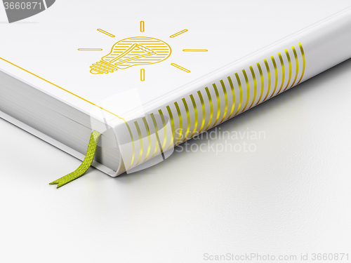 Image of Finance concept: closed book, Light Bulb on white background