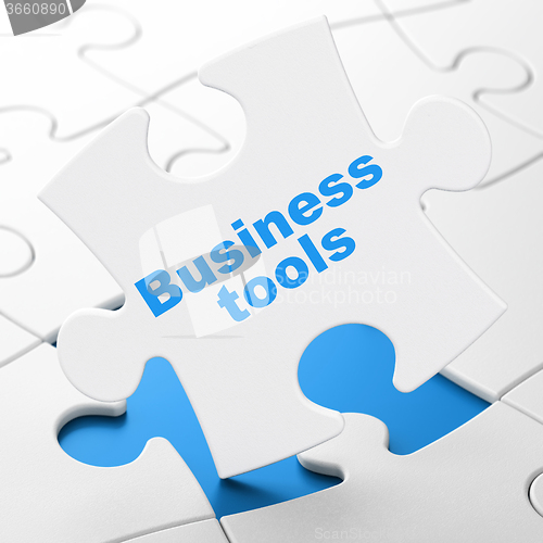 Image of Finance concept: Business Tools on puzzle background