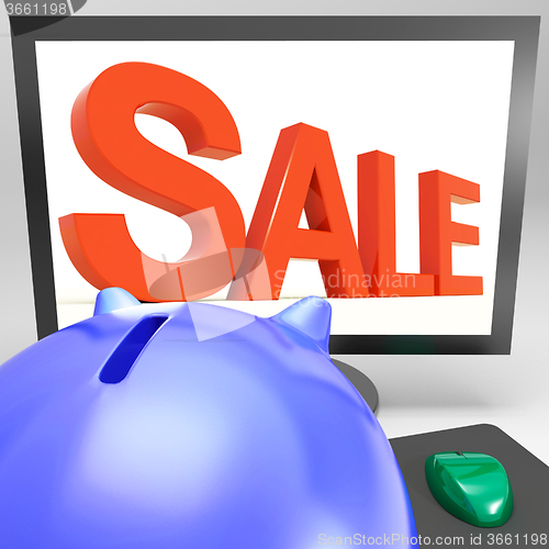 Image of Sale On Monitor Shows Promotional Prices