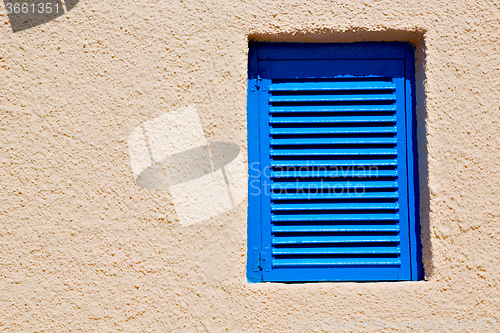 Image of in santorini europe greece   blind yellow wall