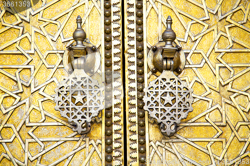 Image of metal rusty  brown    morocco in africa the old gold star