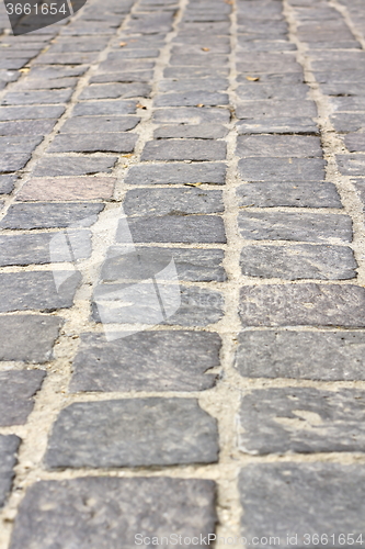 Image of stone tiles on pedestrian pathway