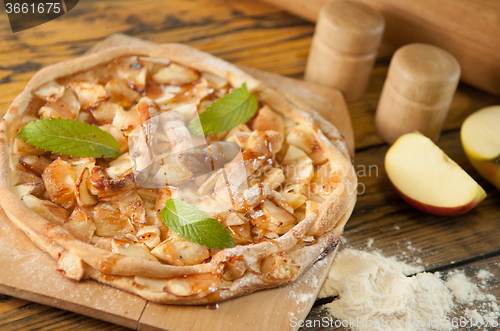 Image of home made apple cake on the wooden table