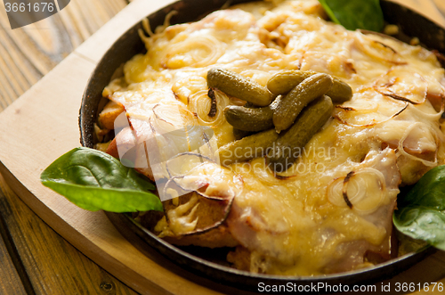 Image of home made casserole on the wooden table