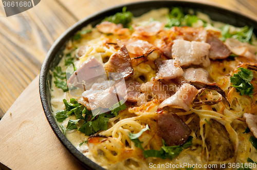 Image of home made casserole on the wooden table