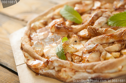 Image of home made apple cake on the wooden table