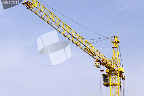 Image of Cranes  against the sky