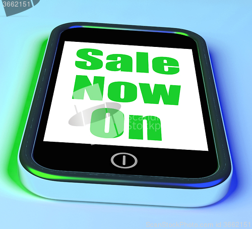 Image of Sale Now On Phone Shows Promotional Savings Or Discounts