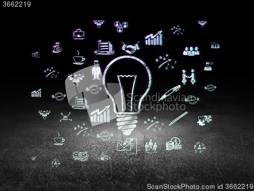 Image of Finance concept: Light Bulb in grunge dark room