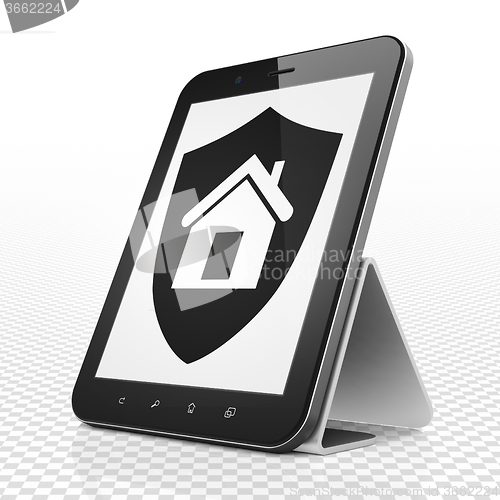 Image of Finance concept: Tablet Computer with Shield on display