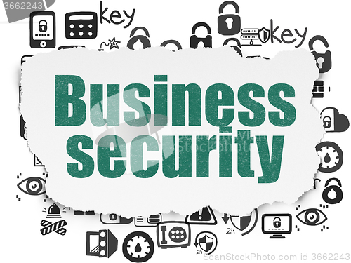 Image of Safety concept: Business Security on Torn Paper background