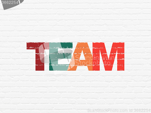 Image of Business concept: Team on wall background
